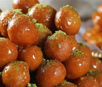 طريقة عمل الزلابية الهشة بالصوصات المميزة